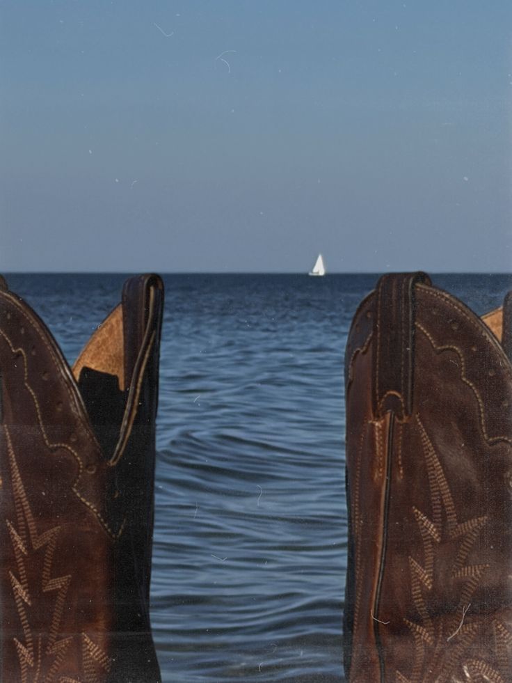 Cowboy boots and denim at dusk